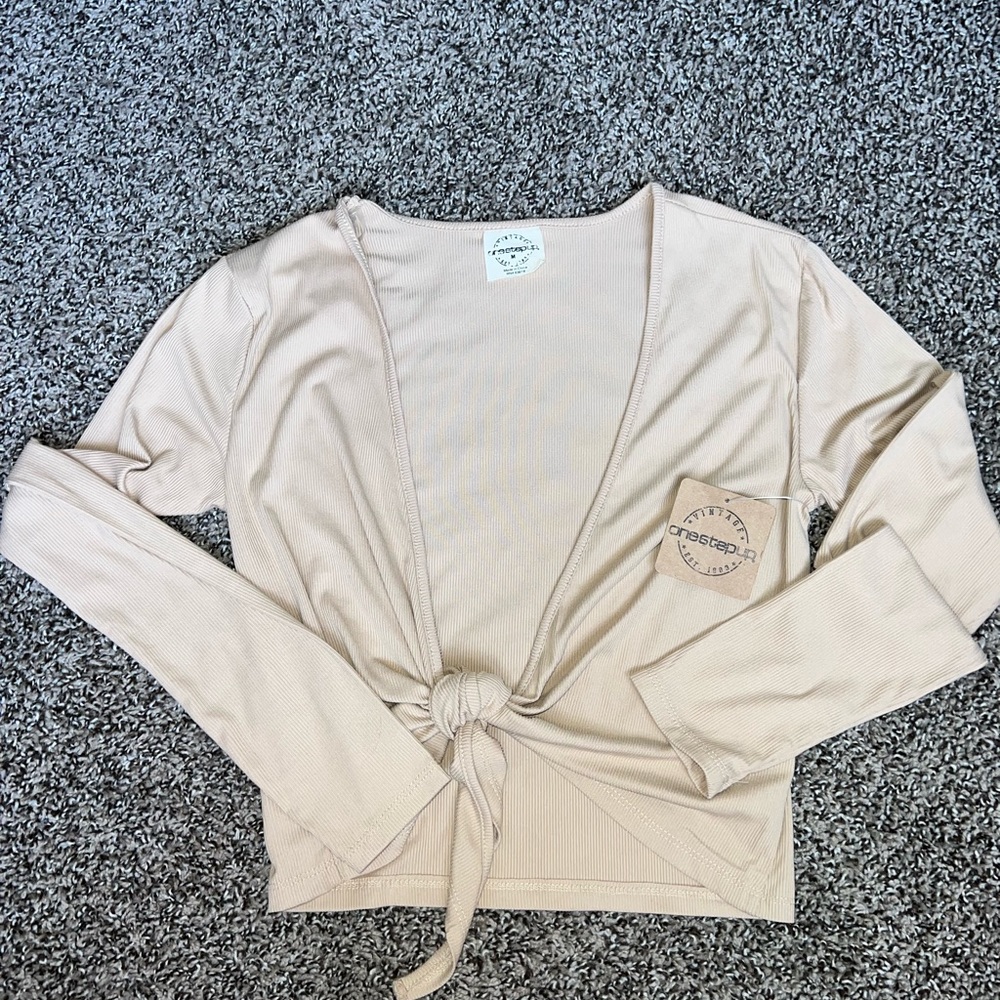 One step up medium nude long sleeve tie front top